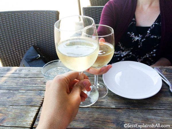 toasting with a glass of chardonnay