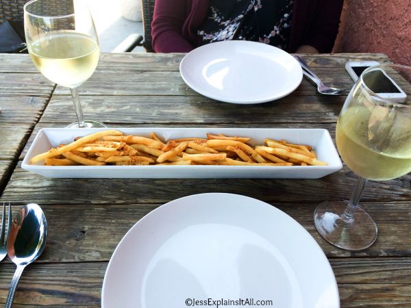 plate of Thai fries and wine