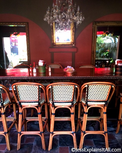Table and chairs with a chandelier