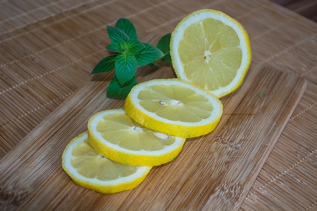 slices of lemon on a cutting board 