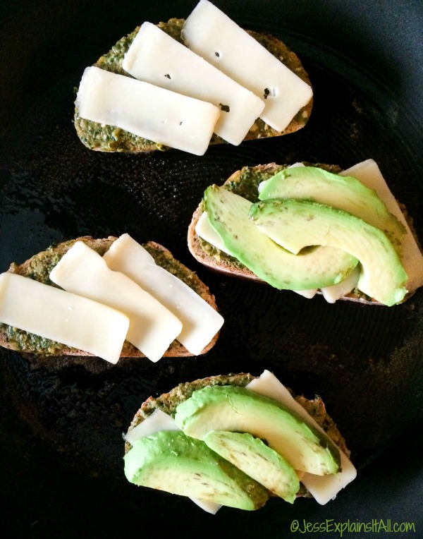 cheese slices and avocado slices on toasts