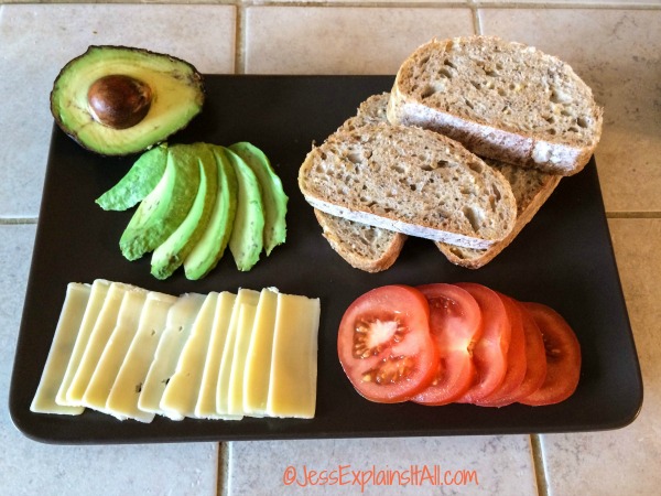 avocado, bread, cheese and tomatoes