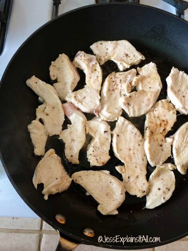 cooking chicken in a pan