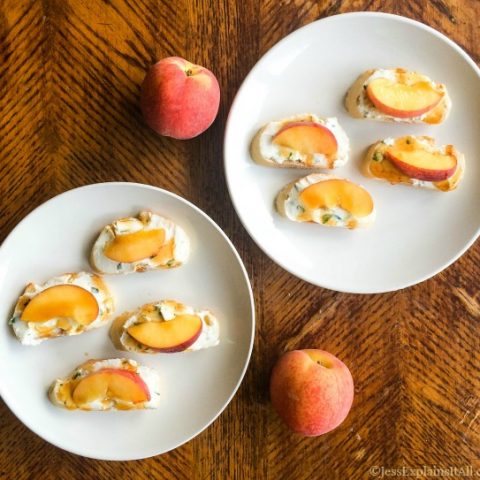 Plates of bread with peaches and cheese